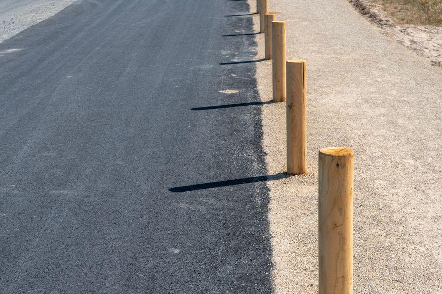 A fresh, smooth strip of black asphalt